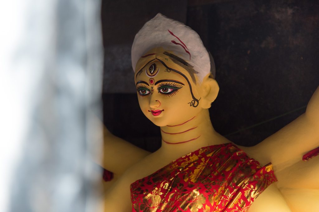 Close up of an incomplete idol of Hindu Goddess Durga