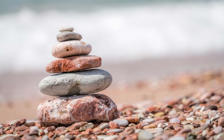 zen-balanced-small-pile-of-stacked-stones-GR5MQKW.jpg